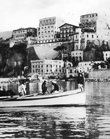 Historic façade of Grand Hotel Excelsior Vittoria overlooking Marina Piccola in Sorrento